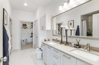 Dual vanities and stand-up showers*